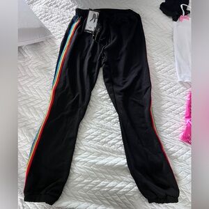 SOLD Dolls Kill Delia’s drop waist Most Wonderful Rainbow Stripe Terry Jogger Sm